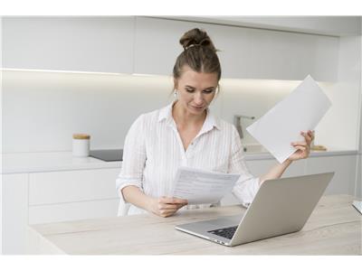 medium-shot-woman-with-papers.jpg